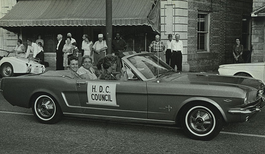 Riding in the Fair Parade, 1965, Fann Woodward (front seat); Alita Winston and Opal Woods (back seat from left); Garland County Extension Homemaker's Club Records MC1117 © Pryor Center for Arkansas Oral and Visual History, University of Arkansas