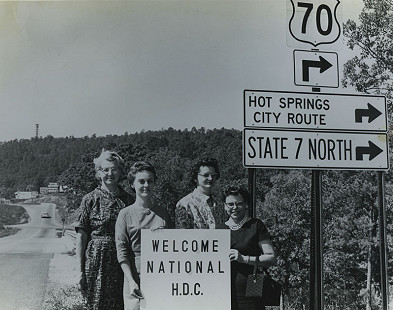 On the way to the National H.D.C. meeting, Mrs. Paul Rukavina, Lake Hamilton HDC, Mrs. James E. Winston, Gardner HDC, Mrs. James A. Worthy, Pleasant Hill HDC, Mrs. Don Wayman, Daniel HDC, 1963-64; Garland County Extension Homemaker's Club Records MC1117 © Pryor Center for Arkansas Oral and Visual History, University of Arkansas