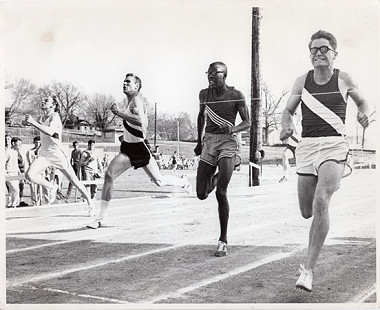 David Gearhart (right) winning track event, Fayetteville High School, 1969 © Pryor Center for Arkansas Oral and Visual History, University of Arkansas