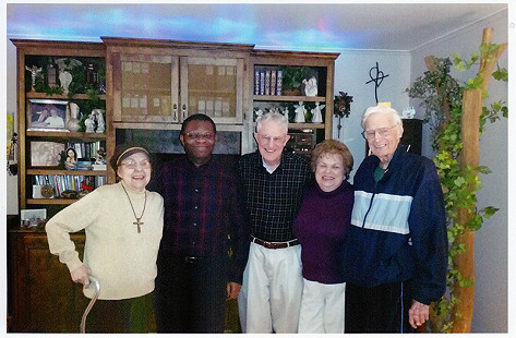 Monsignor John O'Donnell (far right) with friends © Pryor Center for Arkansas Oral and Visual History, University of Arkansas