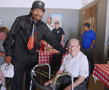 Bobby Rush (left) with Sonny Payne at the Bobby Rush Appreciation Day event, which was held at Southbound Pizza during the King Biscuit Blues Festival; Helena, Arkansas, 2016 © Pryor Center for Arkansas Oral and Visual History, University of Arkansas