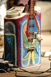 Close-up of a customized gas-can guitar onstage during a performance by James “Super Chikan” Johnson at the Arkansas Blues and Heritage Festival; 2006 © Eric Gorder 2006; egorder@gmail.com