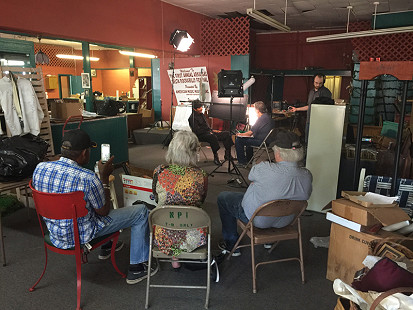 Audience listens to Don Wilcock interview Bobby Rush at Bubba's Blues Corner during the King Biscuit Blues Festival; Helena, Arkansas, 2016 © Pryor Center for Arkansas Oral and Visual History, University of Arkansas