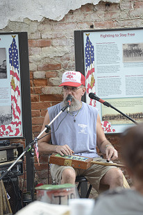 Unidentified musician on Cherry Street during the King Biscuit Blues Festival; 2015 © Eric Gorder 2015; egorder@gmail.com