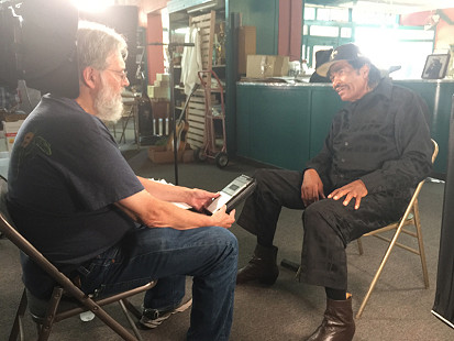 Don Wilcock interviews Bobby Rush at Bubba's Blues Corner during the King Biscuit Blues Festival; Helena, Arkansas, 2016 © Pryor Center for Arkansas Oral and Visual History, University of Arkansas