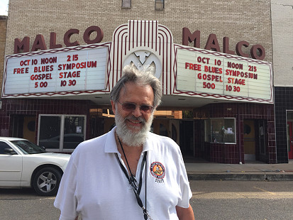 Don Wilcock in front of the historic Malco Theater on Cherry Street during the King Biscuit Blues Festival; Helena, Arkansas, 2015 © Pryor Center for Arkansas Oral and Visual History, University of Arkansas