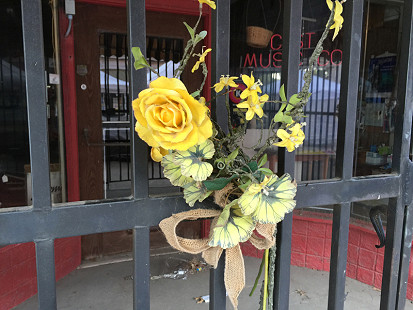 Flowers at the front door of the Gist Music Store; King Biscuit Blues Festival; Helena, Arkansas, 2015 © Pryor Center for Arkansas Oral and Visual History, University of Arkansas