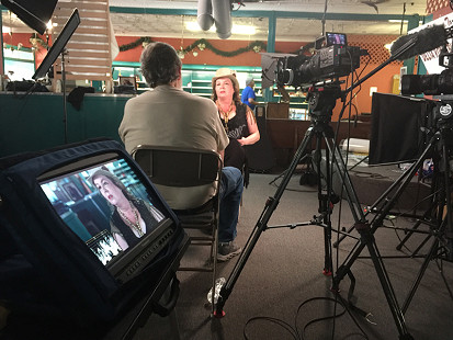 Don Wilcock interviews Christina Vierra at Bubba's Blues Corner during the King Biscuit Blues Festival; Helena, Arkansas, 2016 © Pryor Center for Arkansas Oral and Visual History, University of Arkansas