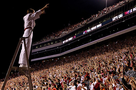 Drum Major Jamey Julian calling the Hogs © Photo courtesy of Chris Knighten