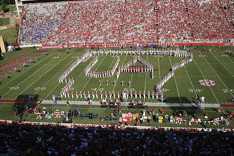 UA letters inside the outline of the state of Arkansas © Copyright RBAA Films