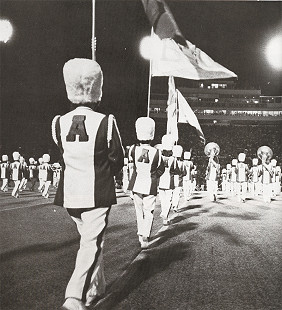 Razorback Band enters the field for halftime at Baylor University, <i>Razorback Yearbook</i>, 1976 © Photo courtesy of Razorback Marching Band