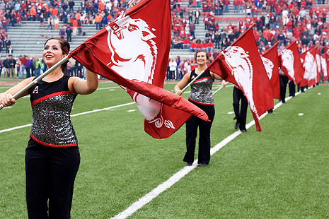 Color guard members with Hog flags in Pregame © Photo by Darinda Sharp