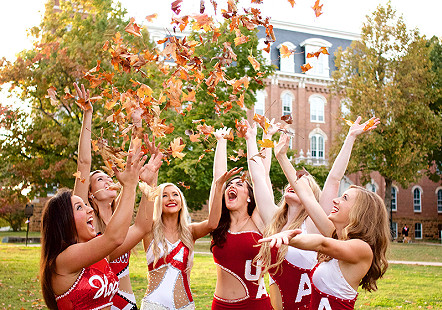 Razorback twirlers on the beautiful campus in Fall © Photo courtesy of Karen Schwartz