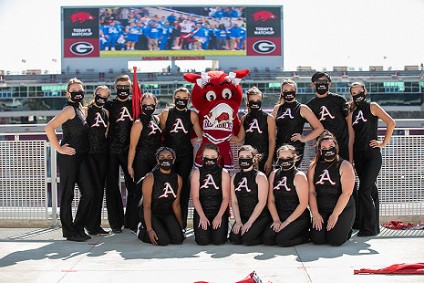 Mascot Soo-iee with Color Guard members on top of the stadium during the game © Photo courtesy of Karen Schwartz