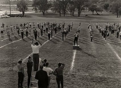 "Doc" Worthington directing the band with soloist, "Doc" Severinson, Fall, 1965 © Photo courtesy of Special Collections, University of Arkansas Libraries, Fayetteville